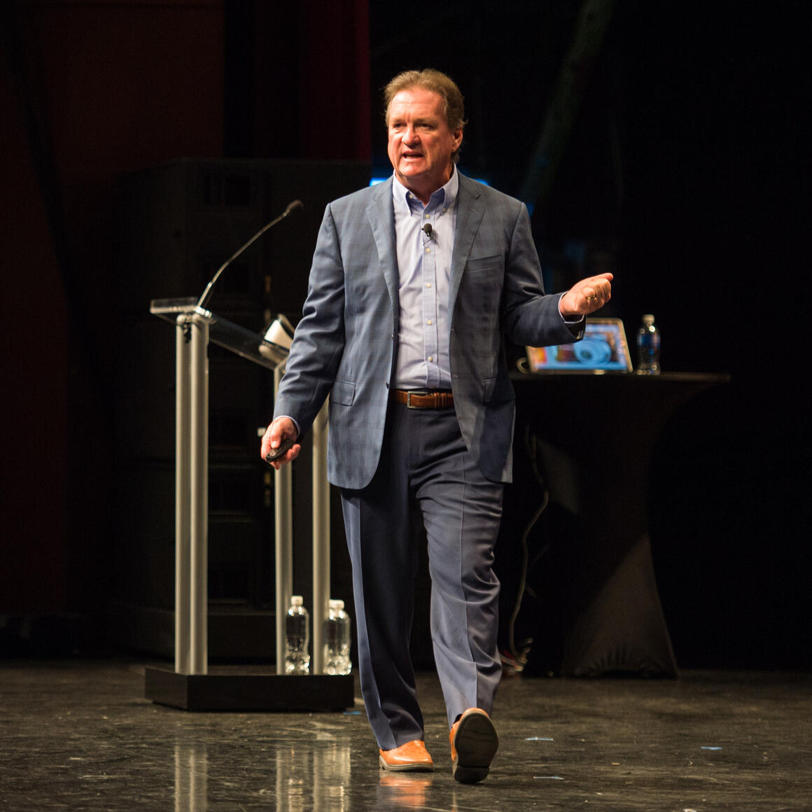 Jim Carroll speaking on stage